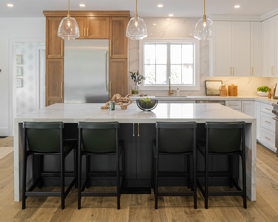 Modern kitchen design with wood colored accents and a wood flooring with clean lines and some filled knots