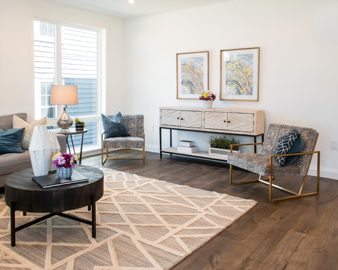 Living room with dark brown wood flooring.