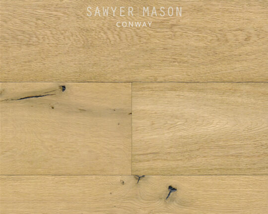 Wire brushed warm brown plank floor.