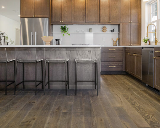dark wood flooring in a kitchen setting