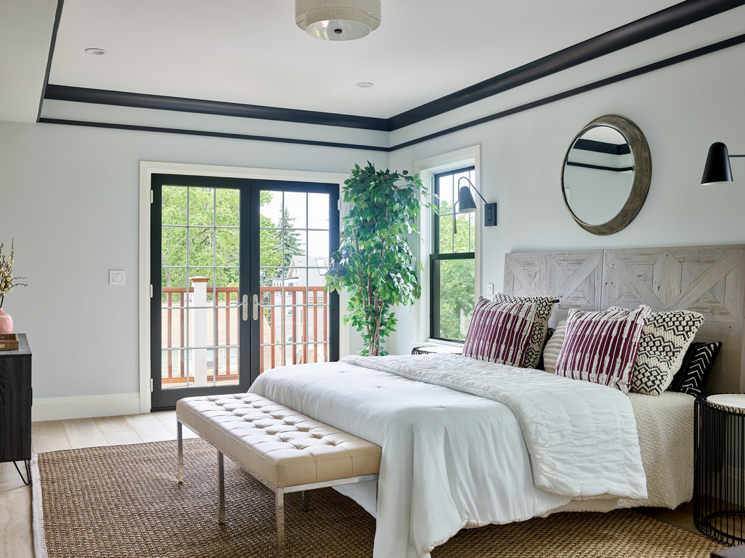 Luxury townhome with modern decorations and bright windows.