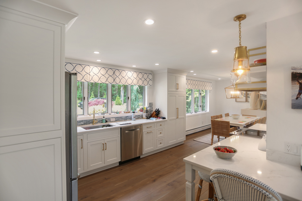 Coastal cottage kitchen with Westport wood flooring.