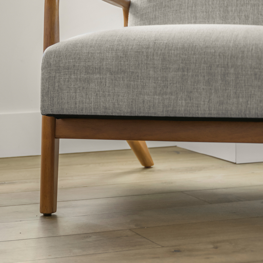 Close up of chair and engineered wide plank flooring.
