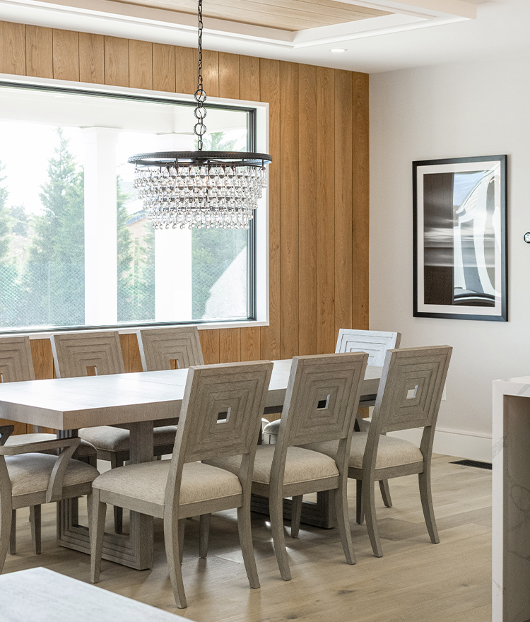 Modern dining room with light brown wood flooring